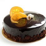 Gâteau moelleux noisettes et orange, glaçage chocolat